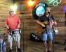 Local musicians T. Lutz and Jack Worthington entertained fans & friends at Fast Eddie's. photo by Rick Kuta